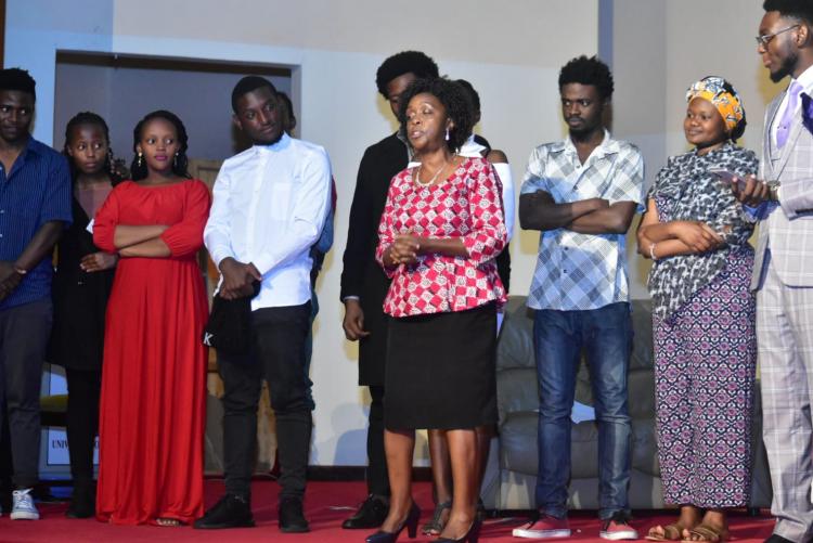 the dean FOL Prof. Winfred applauds cursetomary cast